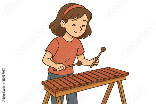 Happy young girl playing a wooden xylophone with mallets, enjoying the percussion instrument