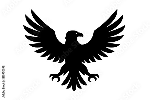 Black silhouette of a majestic eagle with wings spread wide in a heraldic pose