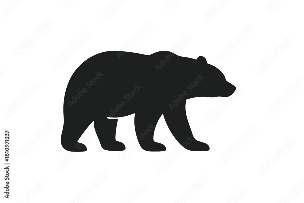 Fototapeta premium Minimalist black silhouette of a large wild bear walking in profile view