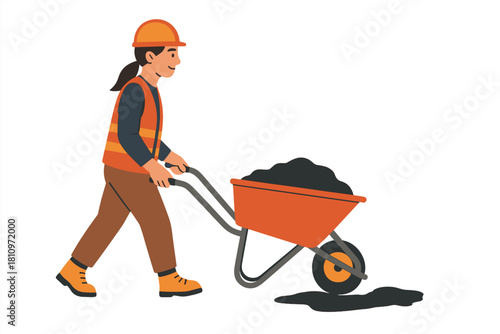 Construction worker in safety gear pushing a wheelbarrow loaded with material