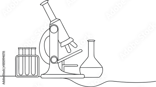 Microscope and laboratory glassware on a white background
