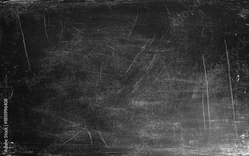 Chalk rubbed out on blackboard background. Empty black chalk board texture. Mockup background