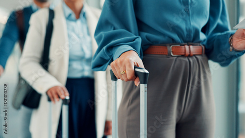 Hands, people and row with suitcase at airport for travel delay, international flight and work trip. Passenger, waiting line and luggage with airplane ticket, check in and boarding for global journey