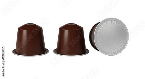 Three coffee capsules in brown and silver isolated on transparent background