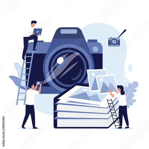 Creative team of miniature photographers work together to organize photos around a giant camera and a photo album.