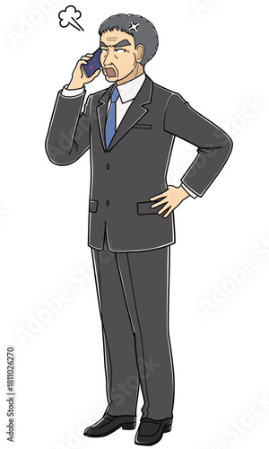 スマートフォンで電話しながら怒っているスーツの中年男性