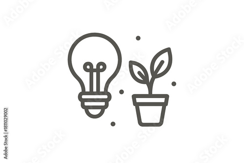Creative idea lightbulb next to potted plant symbolizing environmental growth