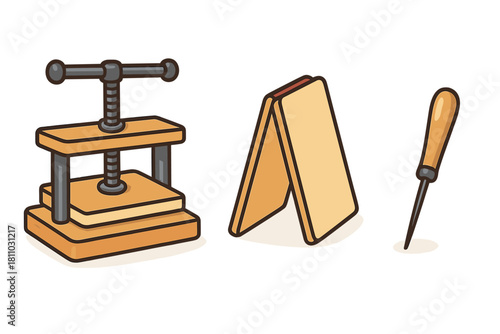 Set of essential bookbinding tools including press, jig, and awl