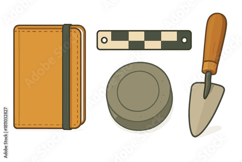 Set of archaeological field tools including notebook, scale bar, trowel, and datum marker