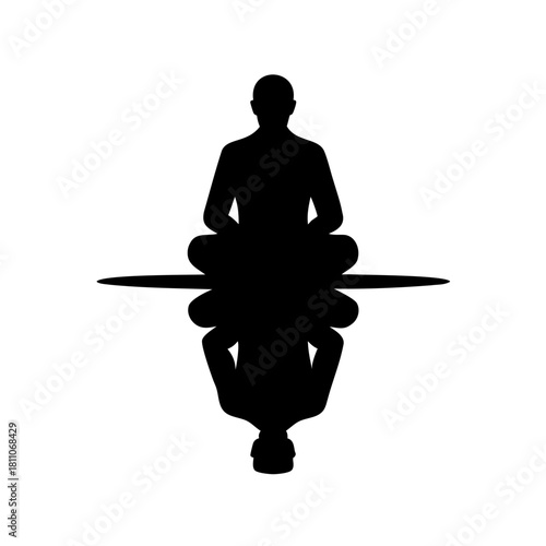 Symmetrical silhouette of a person in meditative pose, creating a geometric reflection