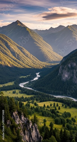 Serene mountain valley with meandering river offering an inspiring scenic landscape view