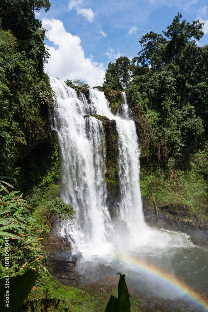 Fototapeta premium Tad Yeung waterfall cascading, creating rainbow in bolaven plateau