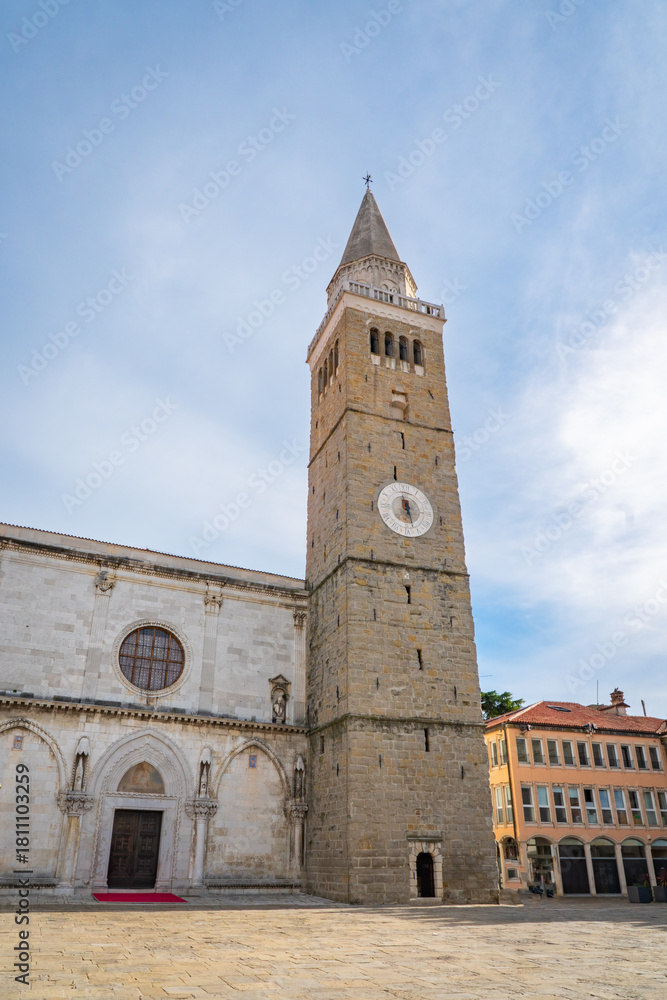 Obraz premium Assumption Cathedral Bell Tower in Koper, Slovenia at Sunny Day