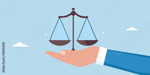 Hand holding scales of justice symbolizing fairness and legal balance