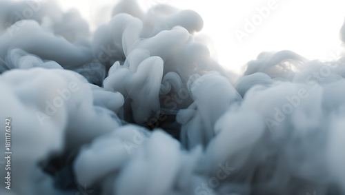 A dense and billowy cloud of grey smoke rises against a clean white background.