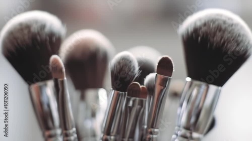 Makeup brushes set in close up shot with blurred background, used for beauty applications