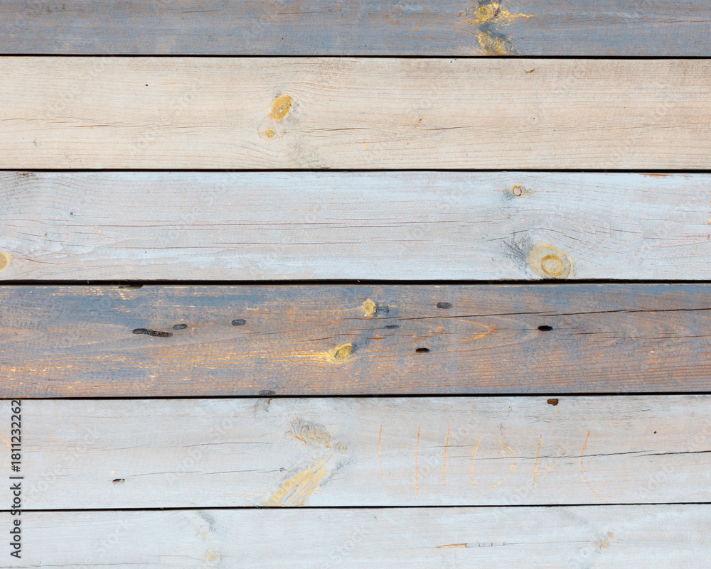 Obraz premium A wooden board with a white stripe