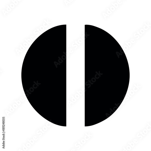 A symmetrical illustration of a circle divided vertically with black halves and white space between