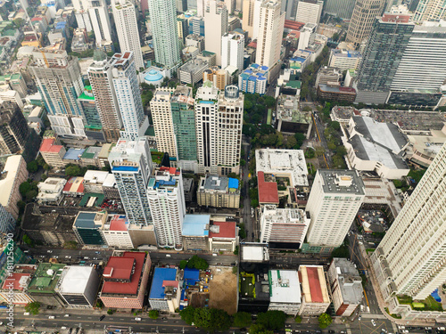 Drone view of Buildings and Business districts in Metro Manila. Makati Cityscape. Philippines.