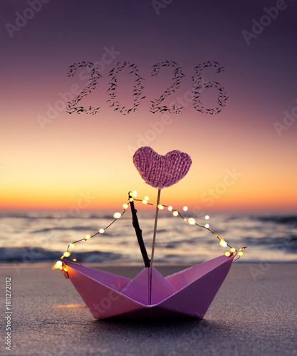 Illuminated Paper Boat at Sunset: A Symbolic Voyage into 2026 with Bird-Formed Numerals in the Sky