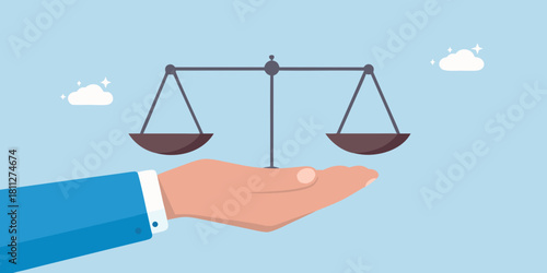 Hand holding scales of justice symbolizing fairness and balance in business