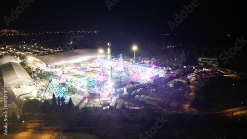 Aerial night view of illuminated amusement park in Portugal