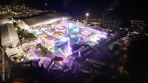 Aerial night view of illuminated amusement park in Portugal
