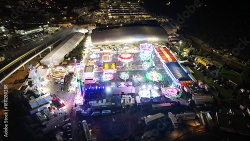 Aerial night view of illuminated amusement park in Portugal