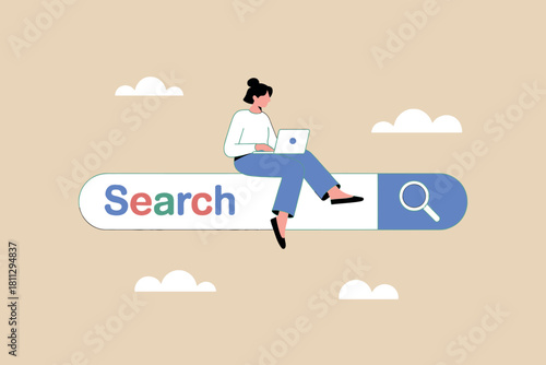 User searching for online information with laptop on search bar