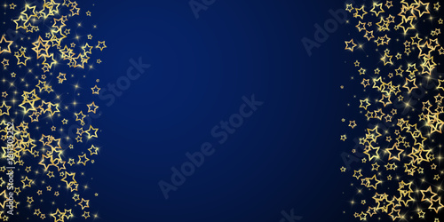 Gold sparkling star confetti.