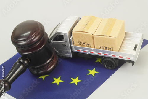 Lorry truck with many boxes on flag of European Union. Export, shipping and delivery to EU concept.