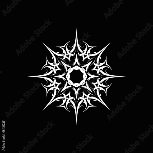 White tribal star design on a black background, featuring intricate spiky patterns radiating from a central circle, creating a stylized snowflake or sunburst effect.