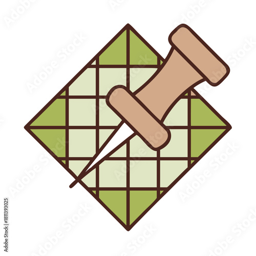 A push pin is stuck into a square grid pattern with alternating light and dark green squares on a white background