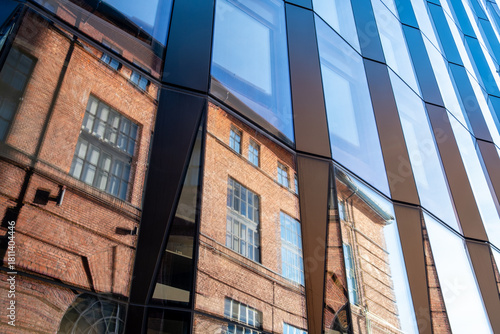 Minimalism and structure shaping a modern architecture facade where geometry, symmetry, reflection, coherent urban design and precise architectural detail align visually