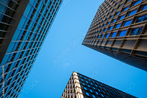 Dynamic geometry and reflection elevating a modern architecture facade that blends symmetry, structure, minimalism, cohesive urban design and accurate architectural detail