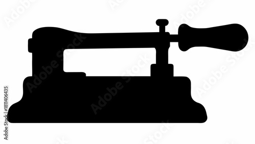 Silhouette of a hole puncher with a handle and lever mechanism for making holes in paper exactly