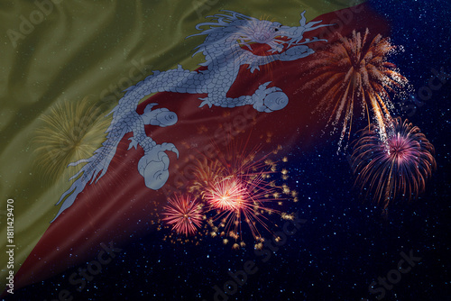 Flags of Bhutan flutters in night sky with fireworks