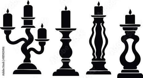Black silhouette of four different candle holders with lit candles in simple elegant design