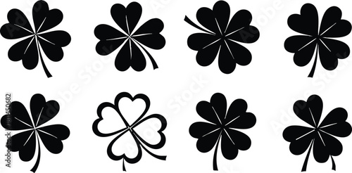Collection of black four-leaf clover icons in various styles for good luck and design elements