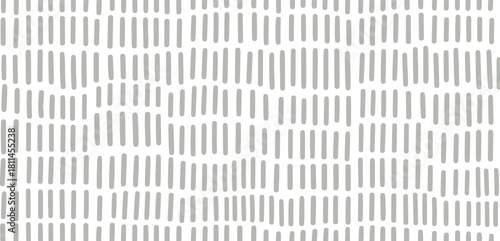 Abstract seamless pattern with irregular hand-drawn vertical grey dashes on a white background, perfect for contemporary design, fabric, or wallpaper projects