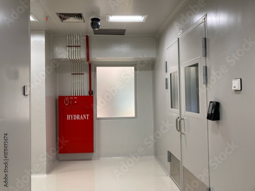 Cleanroom facility with fire safety equipment and access control