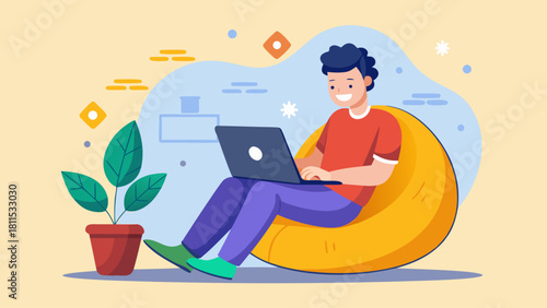 A man is sitting on a yellow bean bag chair and using a laptop. He is smiling and he is enjoying his time. Concept of relaxation and leisure