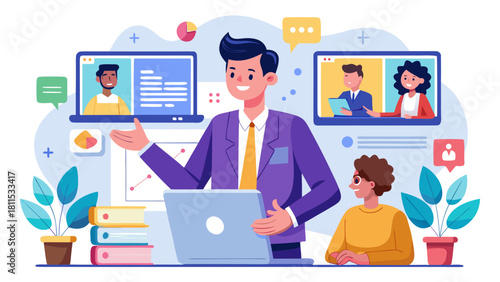 A man is sitting at a desk with a laptop and a book. He is smiling and he is happy. There are several other people in the background, some of whom are also smiling