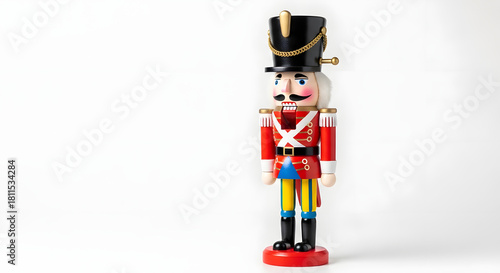 Nutcracker toy soldier standing on white background for holiday decorations  