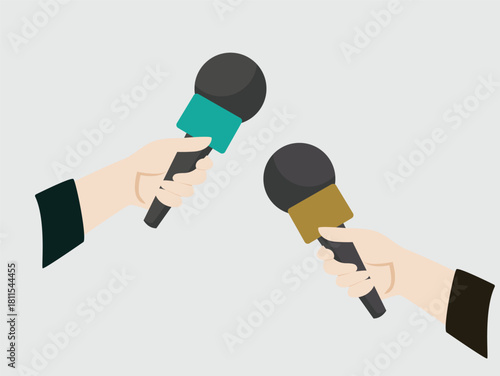 Two hands holding microphones with different colored grips, against a light gray background, suggesting an interview or press conference.