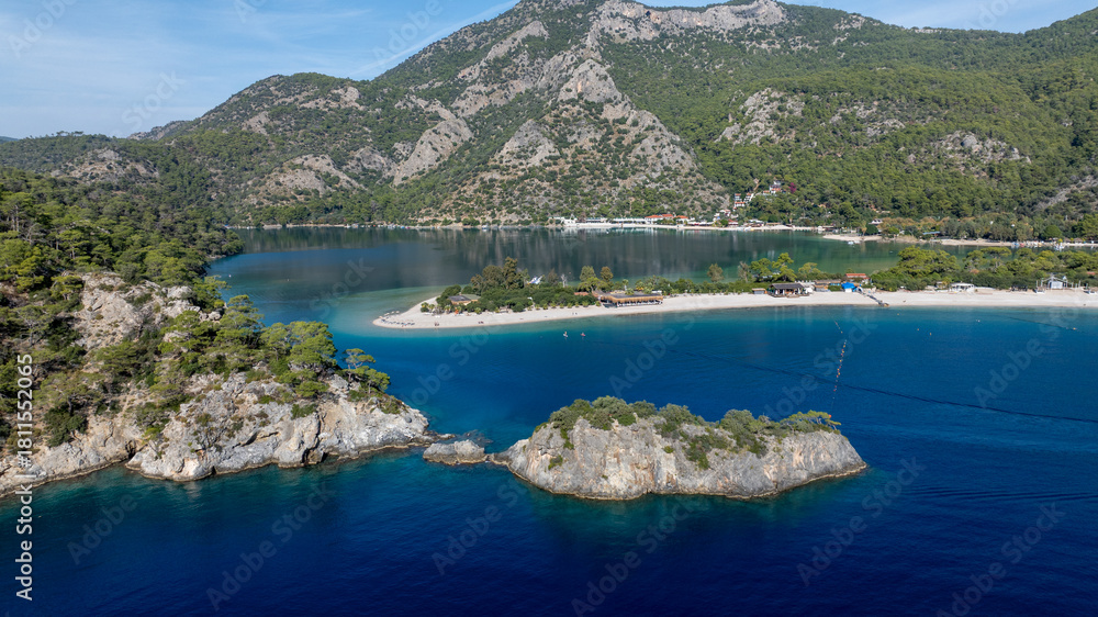 Obraz premium Scenic aerial footage capturing the bright blue lagoon and surrounding natural beauty.