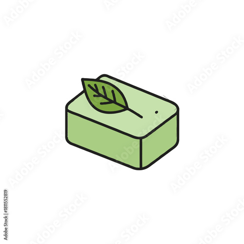 A vibrant green soap bar adorned with a delicate leaf symbolizes natural cleansing and refreshing