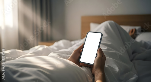 Relaxing in bed scrolling on mobile phone mockup