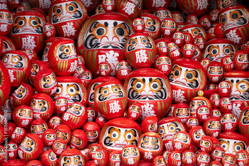 Detail of red daruma dolls at Katsuoji temple  in Japan