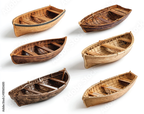 Collection of handcrafted wooden rowboats isolated on a clean white background